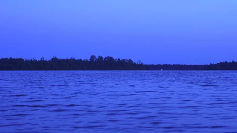Dim Blue Sunset over Lake Timelapse Stock Footage 255795244