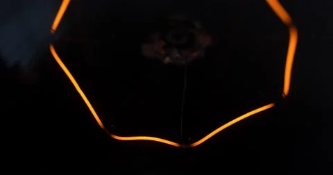 Dim light bulb isolated filament glow slow flashing Stock Footage 54194107