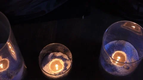 Dim light of candles burning and illuminating restaurant 스톡 동영상 192972623