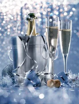 Dim light white silver and blue romantic new year eve or christmas table in.. Stock Photos