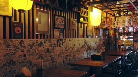 Dim old-style wooden interior design of the Ishiyama Japanese Restaurant Stock Footage 334586072