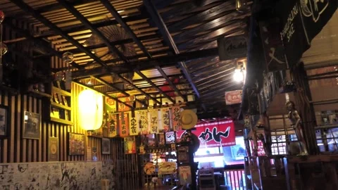 Dim old-style wooden interior design of the Ishiyama Japanese Restaurant Stock Footage 336793648