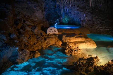 The dim reflection of the Blue Spring and the edge of the path Stock Photos