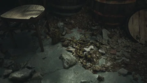 Dim room with a broken stone floor and scattered remnants Stock Footage 304506836