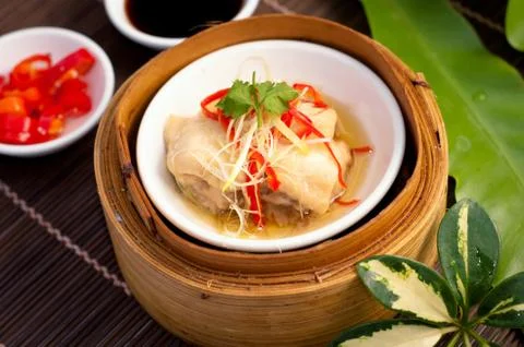 Dim sum in bamboo steamer Stock Photos