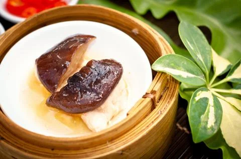 Dim sum in bamboo steamer Stock Photos
