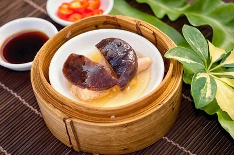 Dim sum in bamboo steamer Stock Photos