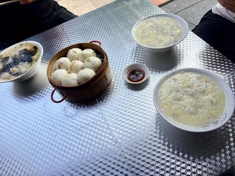 Dim Sum Breakfast with Steamed Buns and Congee Stock Photos