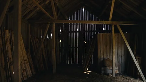 Dim Wooden Barn Interior With Light Through Slatted Walls Stock Footage 334499317