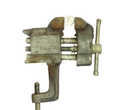 Dime squeezed in vice Stock Photos