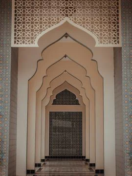 Diminishing perspective interior view of inner Bang O mosque hallway leading Stock Photos