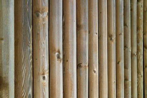 Diminishing perspective of vertical stripe pattern of wooden fence Stock Photos