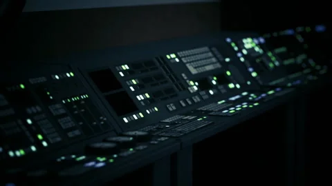 A dimly lit sci fi laboratory features an array of glowing control panels Stock Footage 304467812