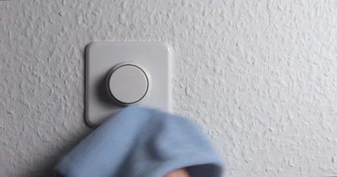 Dimmer button cleaning with man hand close up Video stock 148894844