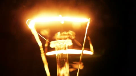 Dimming electric bulb lamp macro closeup Stock Footage 58801800