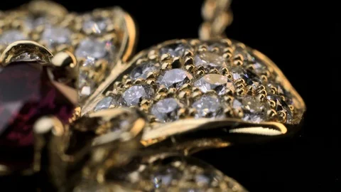Dimond ring with Ruby in gold jewelry Stock Footage 92390638