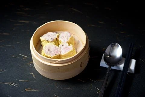 Dimsum in bamboo container Stock Photos