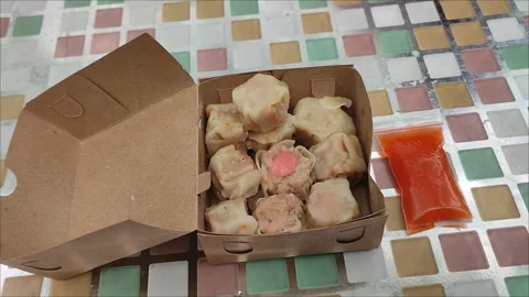 Dimsum food a snack with a steamed processing process serve with chili sauce. Stock Footage 276406270