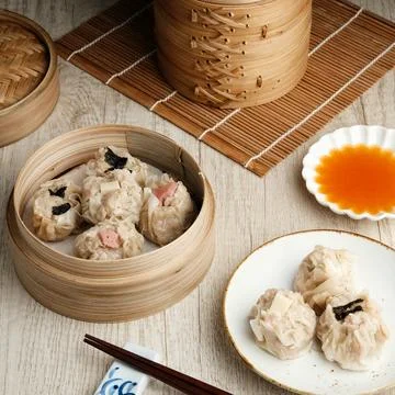 Dimsum with various toppings Stock Photos