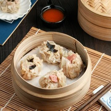 Dimsum with various toppings Stock Photos