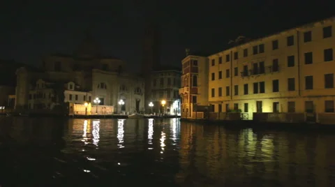 The dinamic view on night venice architecture from moviing gondola boat Stock Footage 67407581