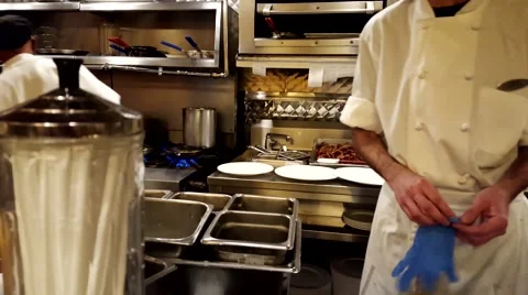 Diner cooks making Breakfast in 4k Stock Footage 56569459