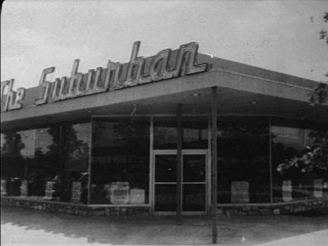 Diners eat and staff work at a restaurant in Levittown, PA in the 1950s. Video stock 75274169