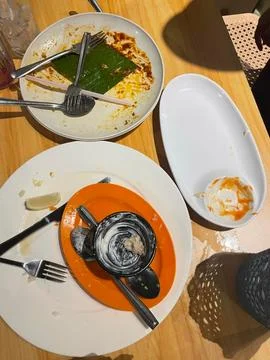 Diners Leave Plates Cleared After Spicy Feast Stock Photos