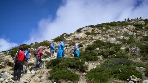 DINGBOCHE, NEPAL - 14 SEPTEMBER 2017 :Trekkers Climbing Hill, Everest Base Ca Stock Footage 85624140