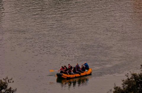 A dinghy on the Adige River. Stock Photos