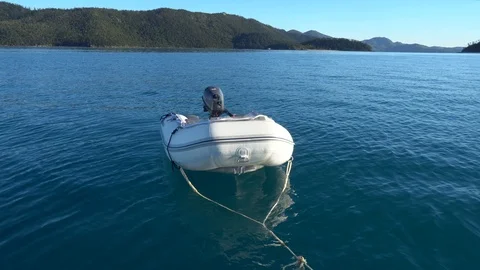 Dinghy on back of boat Stock Footage 116293256