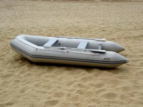 Dinghy Boat With Oars Stock Photos