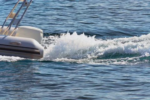 Dinghy with outside board engine Stock Photos