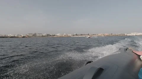 A dinghy pulling out of the Monastir marina in Tunisia Stock-Footage 243038144