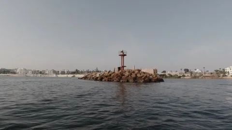 A dinghy pulling out of the Monastir marina in Tunisia Stock-Footage 243038150