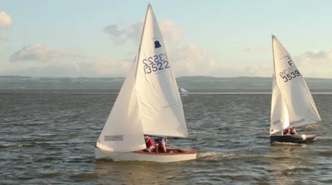 Dinghy racing, tacking round buoy Stock Footage 11344220