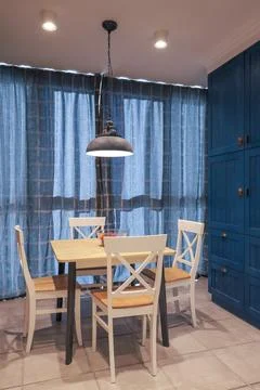 Dining area with chairsin in flat Fotos Stock