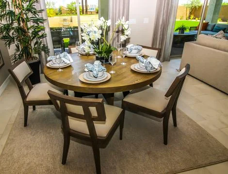 Dining Area Table With Five Place Settings Stock Photos