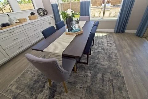 Dining Area Table With Runner And Centerpiece Stock Photos