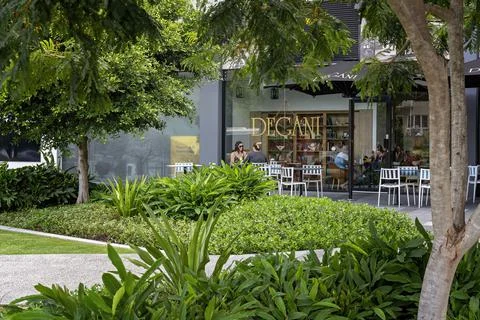 Dining In Cafe And Garden Stock Photos