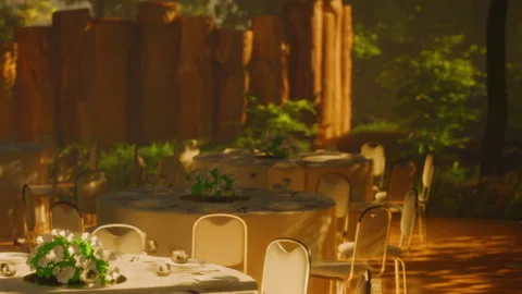 Dining in a Magical Forest Setting With Elegant Tables and Soft Sunlight Stock Footage 344953330