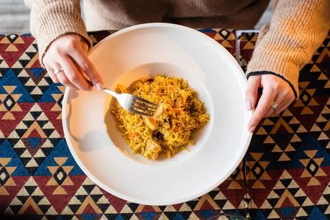 Dining with Rice Dish on Geometric Tablecloth Stock Photos