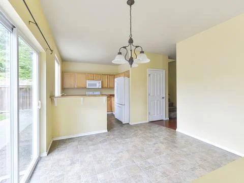 Dining room and kitchen interior Stock Photos