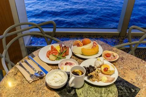 Dining Room Buffet aboard the abstract luxury cruise ship. Healthy breakfast at Stock Photos