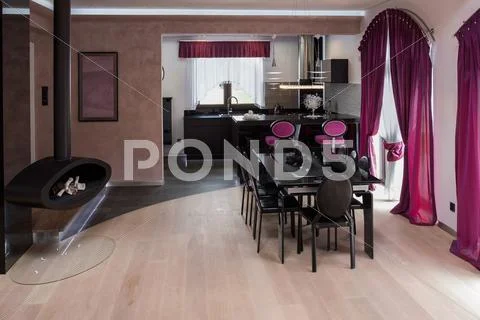 Dining room with fireplace Stock Photos