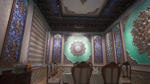 Dining room with richly colored walls and ceiling with Arabic-oriental patterns Stock Footage 204874879