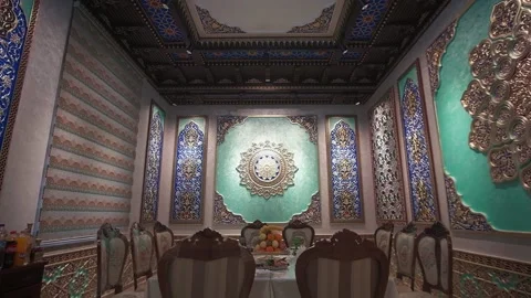 Dining room with richly colored walls and ceiling with Arabic-oriental patterns Stock Footage 204875429
