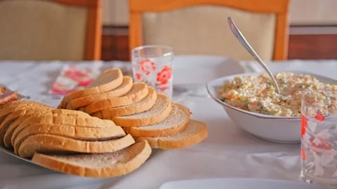 Dining Room Table Prepared with Tasty Food Salad and Tableware for Family Dinner Stock Footage 267265430