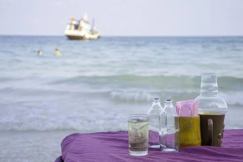 Dining setup table with a stunning sea beach view Stock Photos