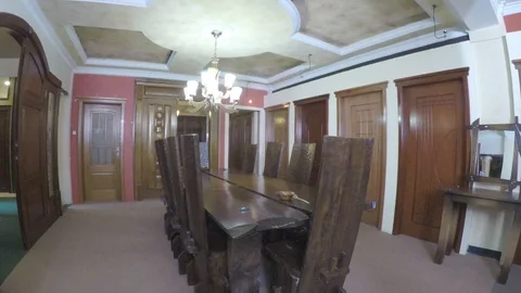 Dining table and high back chairs lines pan display. Stock Footage 97226480